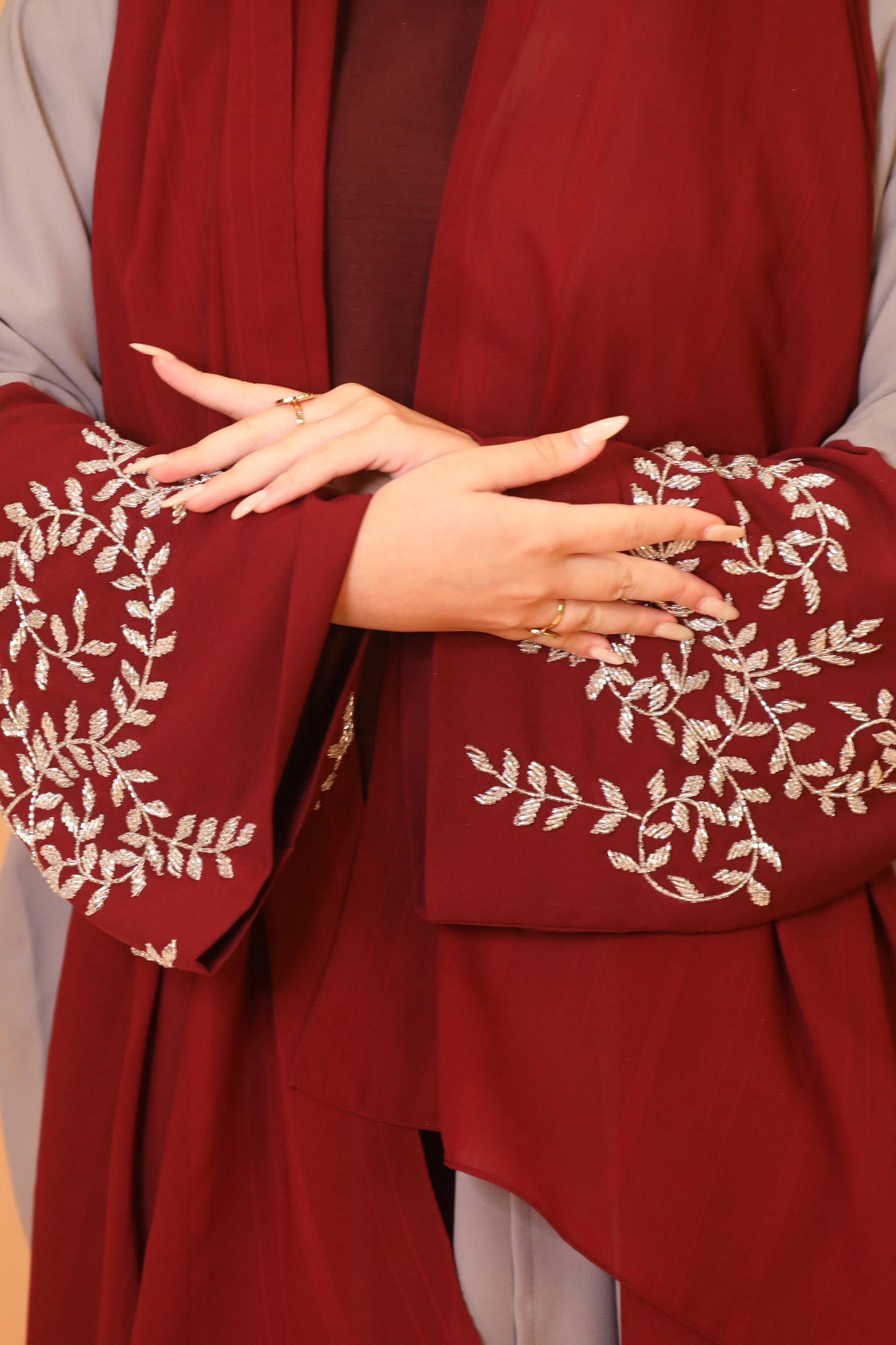 Gray and red abaya
