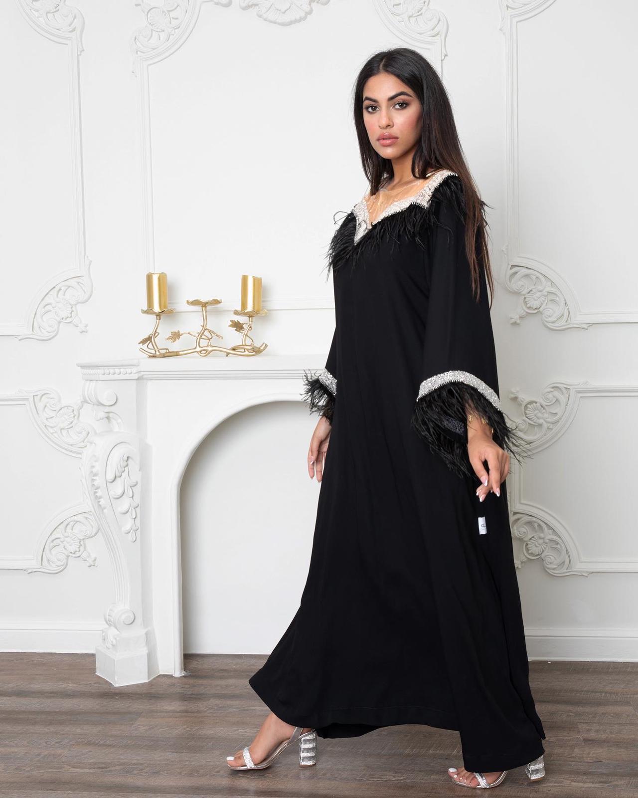Feather crystals embellished black dress