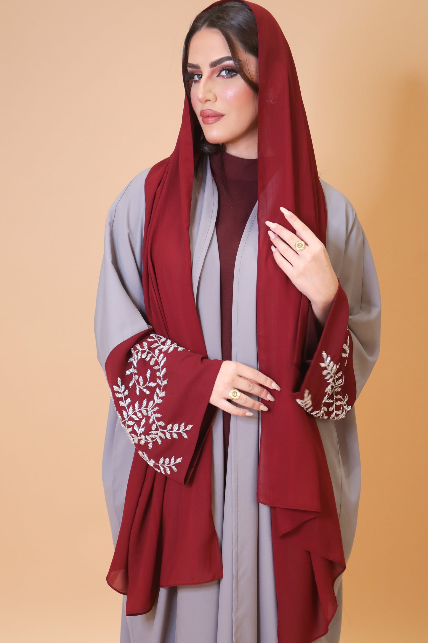 Gray and red abaya